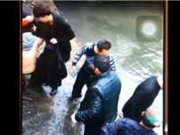 手机近距离拍摄热心市民跳河救人